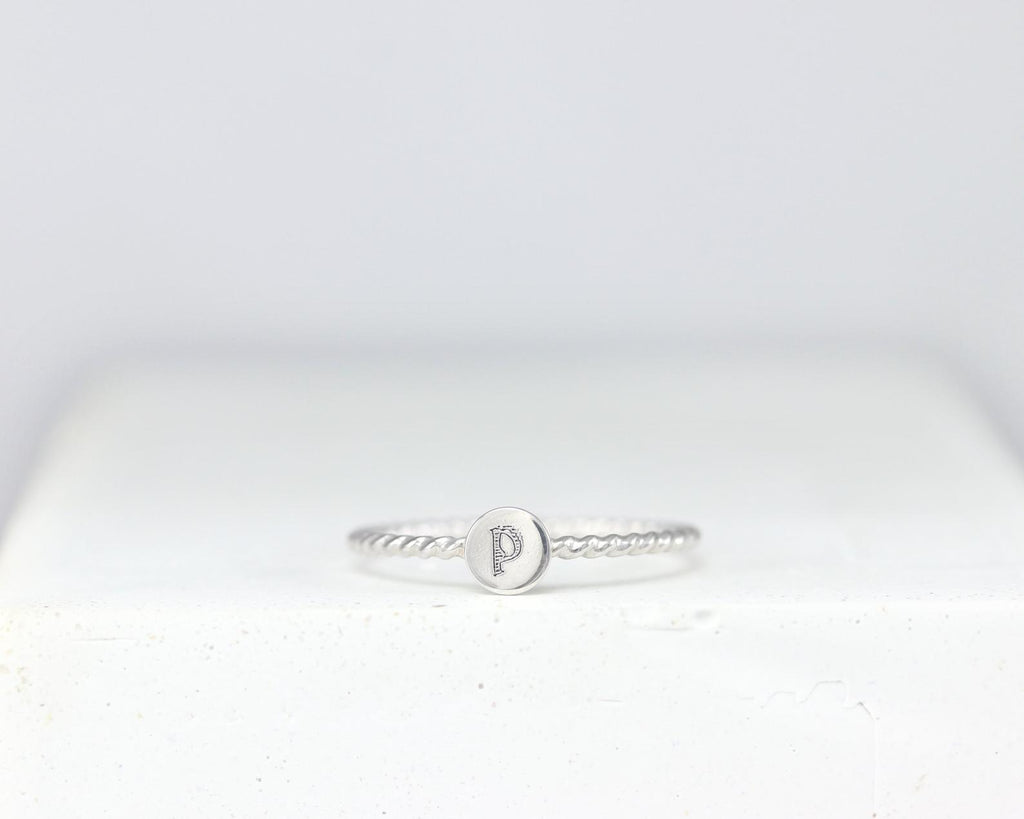 Twisted Initial Ring